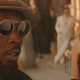 Michael K. Williams and Kristen Wiig, Giles Dunning/IFC